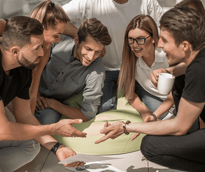 A group of coworkers in a teamworking exercise